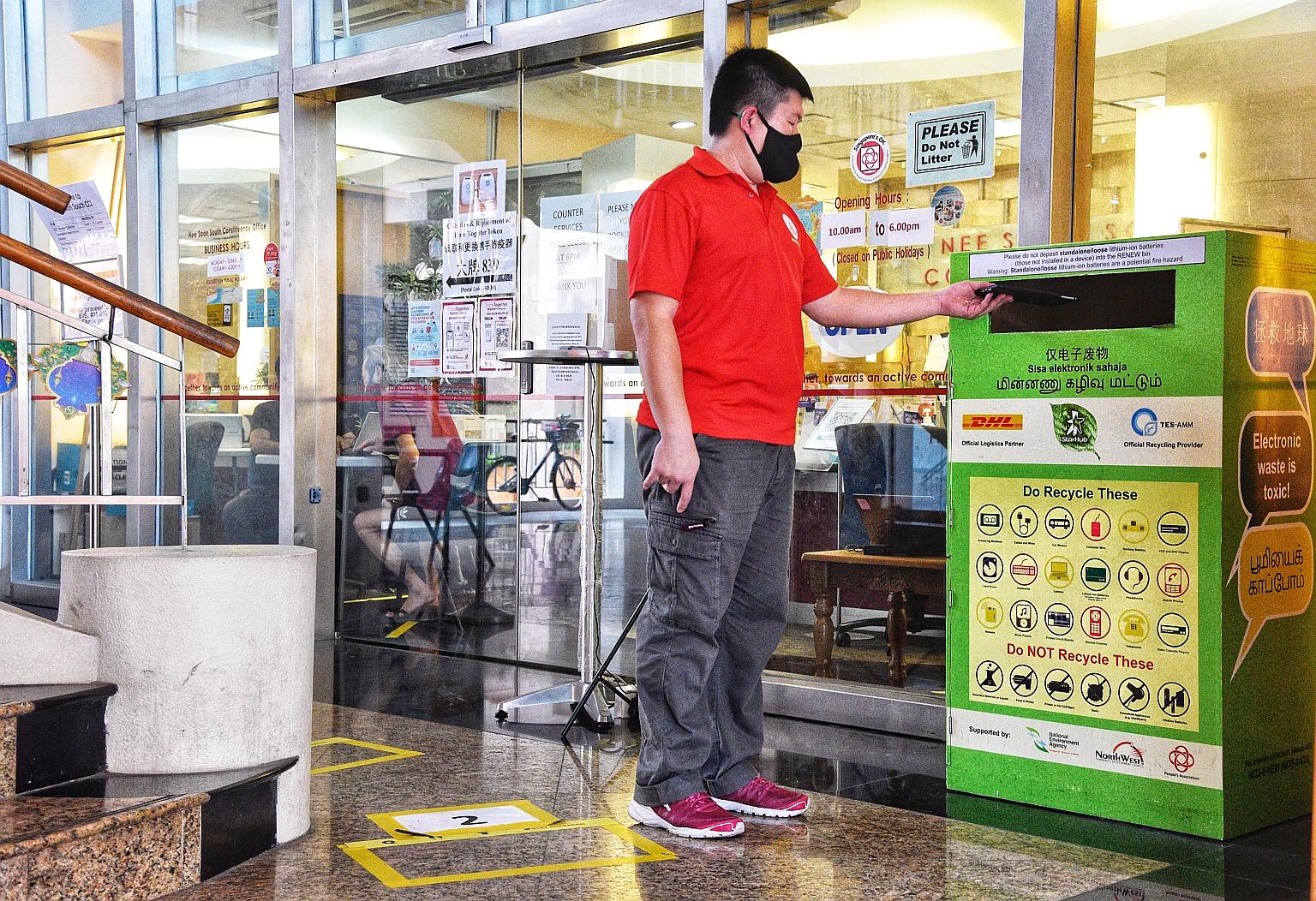 An e-waste recycling bin under StarHub's Renew programme. The upcoming national e-waste recycling programme will replace voluntary industry-led programmes for regulated consumer electronic products, says the National Environment Agency. ST PHOTO: DES