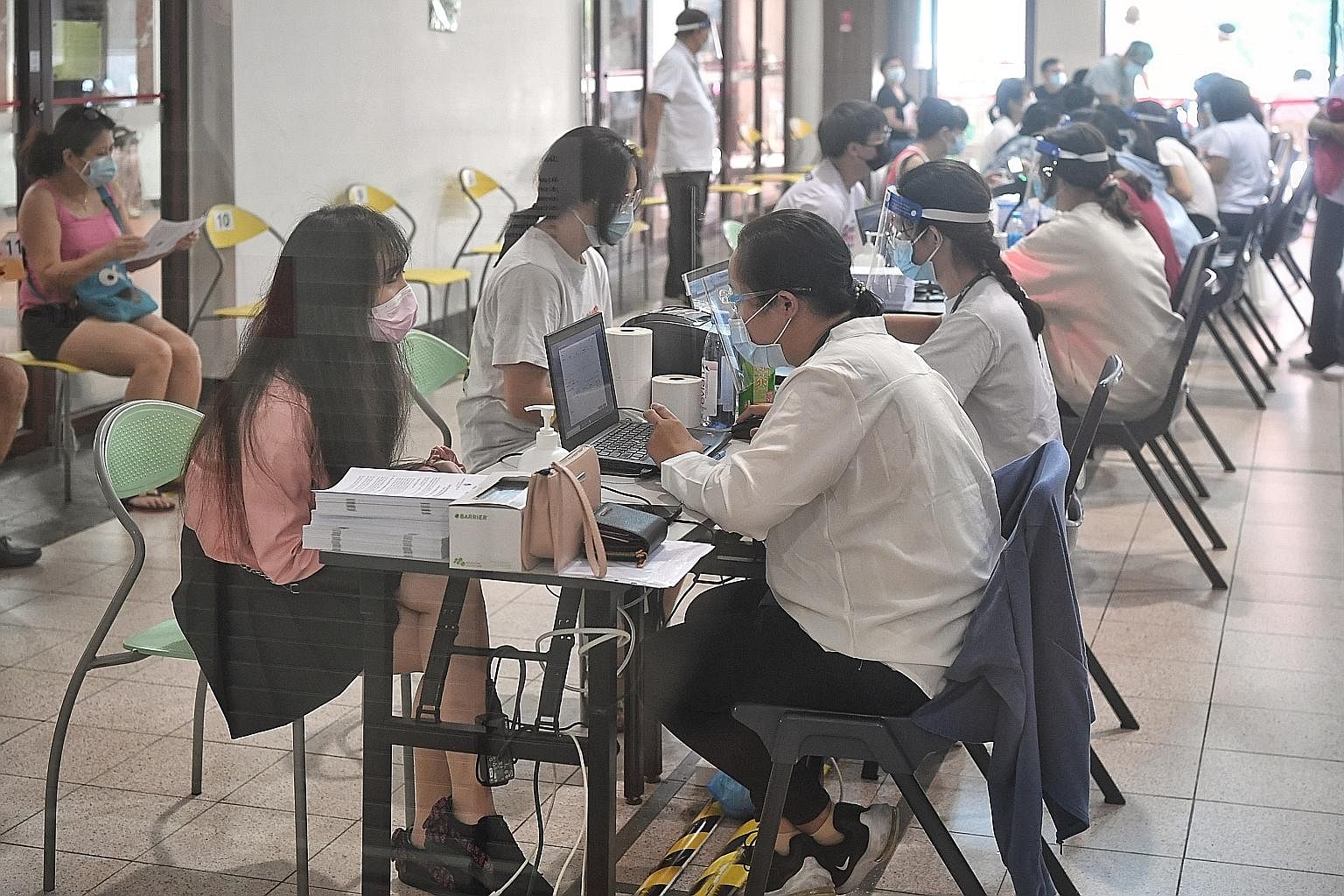Students at Tanjong Pagar Community Club were among the first in their age group to get their Pfizer shots for Covid-19 yesterday, on the first day of the nationwide drive to vaccinate more than 400,000 schoolchildren aged 12 and above. Priority is b