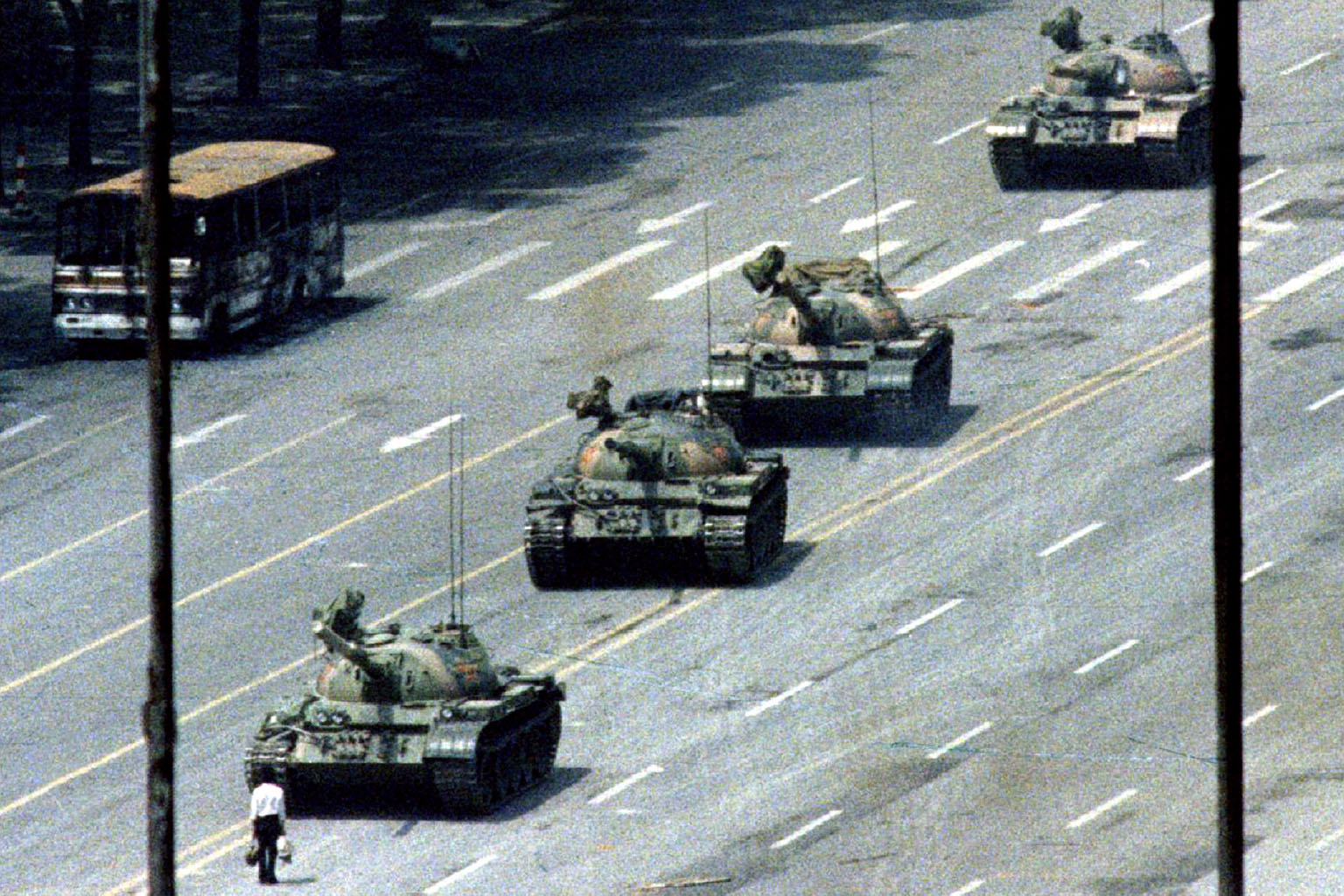 File photo of an unidentified person standing before tanks in China's Tiananmen Square during pro-democracy demonstrations in June 1989.