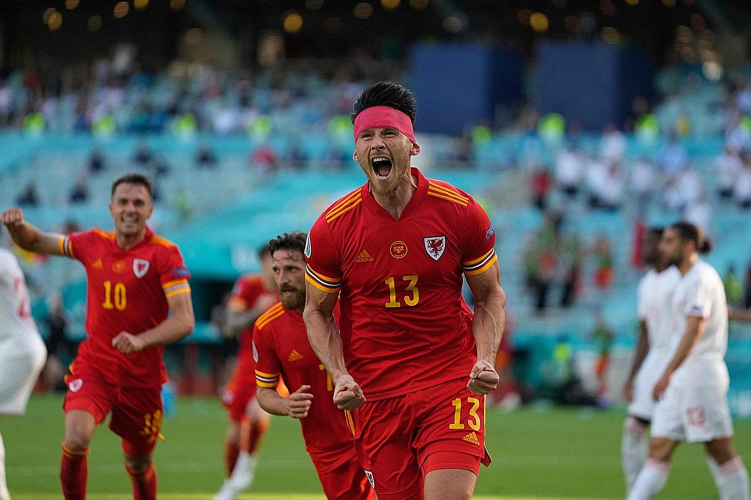 Wales striker Kieffer Moore celebrating his equaliser in the 1-1 draw with Switzerland in their Group A encounter yesterday.