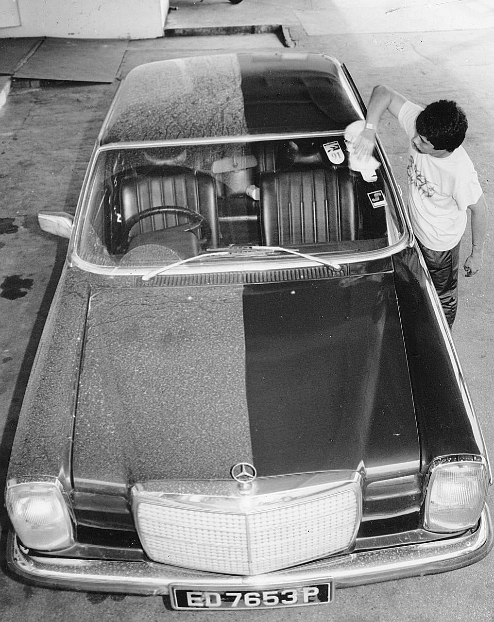 Car owners in Singapore wiping down their vehicles on June 17 and 18, 1991, after ash from the eruption of Mount Pinatubo in the Philippines was blown more than 2,400km to the Republic by high winds.