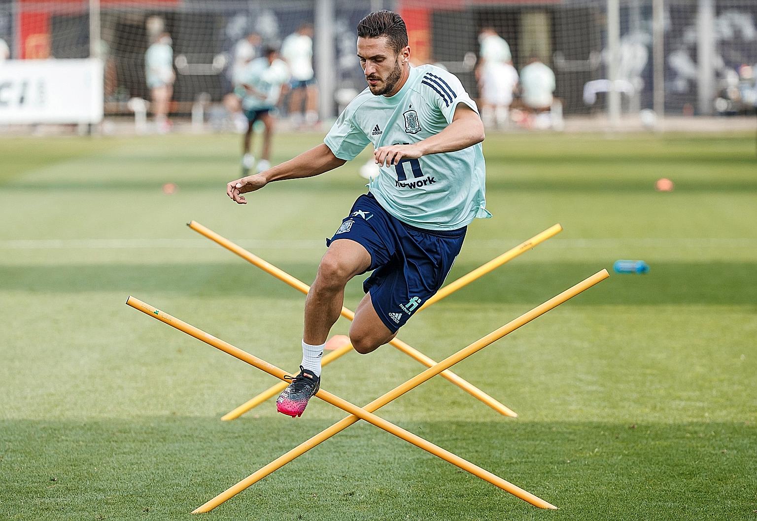 Spain midfielder Koke going through the paces at a training session in Madrid. He is likely to play alongside Rodri and Thiago Alcantara in midfield for La Roja as they take on Sweden in their first Euro 2020 game today.