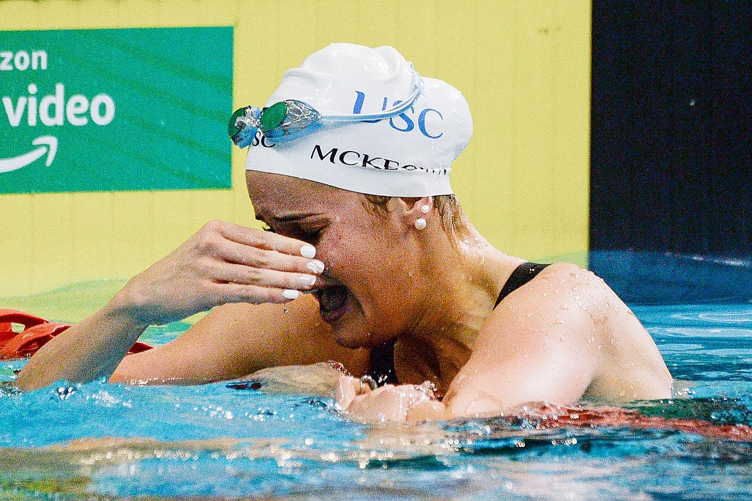 An emotional Kaylee McKeown after setting a 100m backstroke world record of 57.45sec yesterday at the Australian Olympic swimming trials in Adelaide. She dedicated it to her father who died last year.