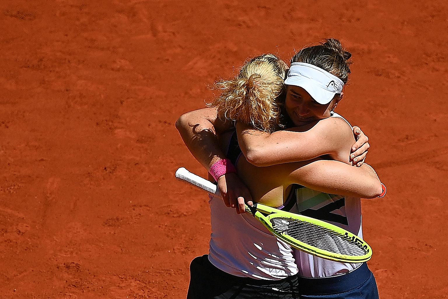 Czech Republic's Barbora Krejcikova (white cap) celebrating with compatriot Katerina Siniakova after winning the women's doubles final yesterday. The second seeds beat Poland's Iga Swiatek and American Bethanie Mattek-Sands 6-4, 6-2. PHOTO: AGENCE FR