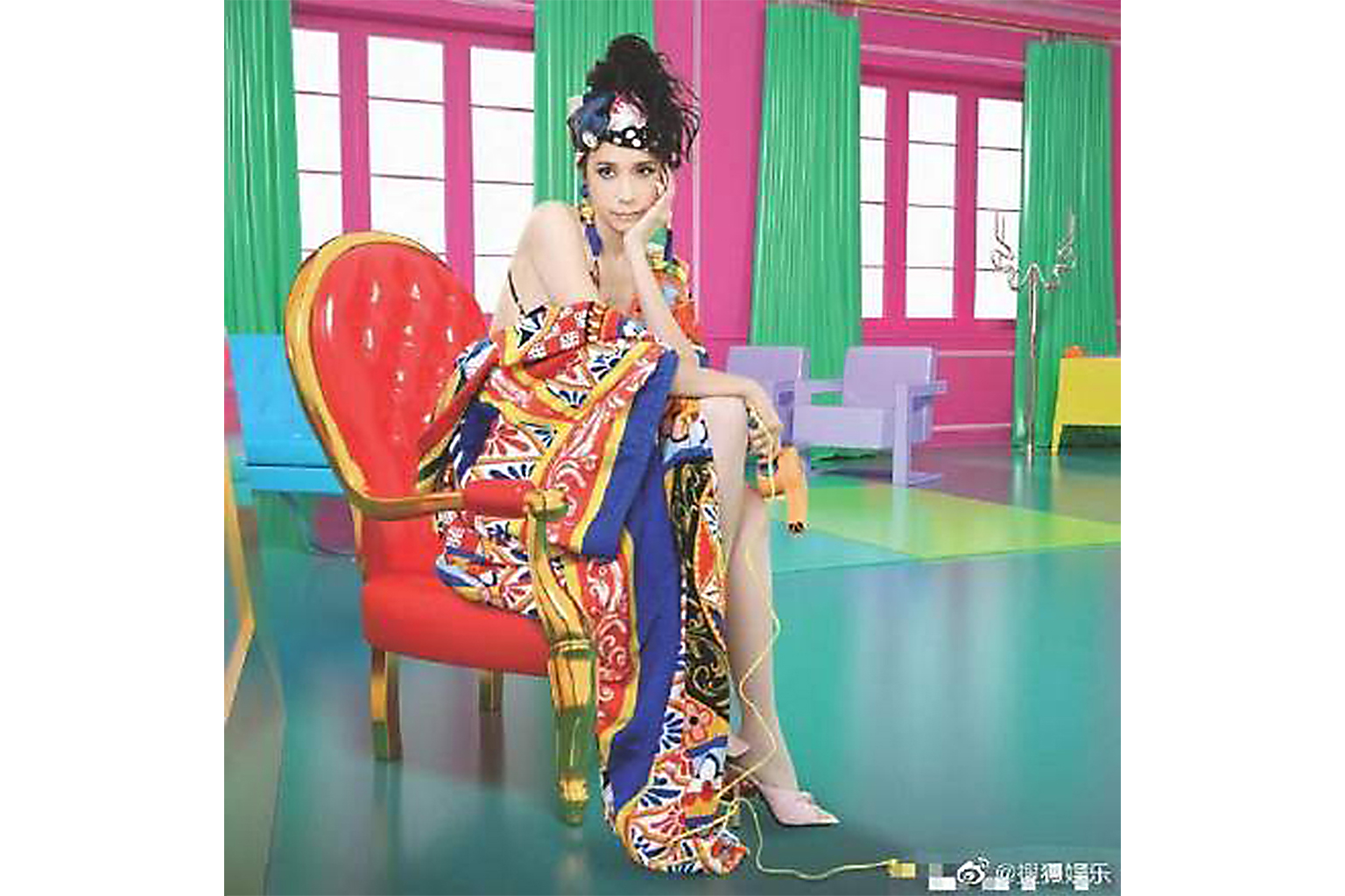Singer Karen Mok in the Dolce & Gabbana bathrobe in her new music video. She has since removed photos of her wearing this outfit from her social media accounts as well as the music video from all platforms.
