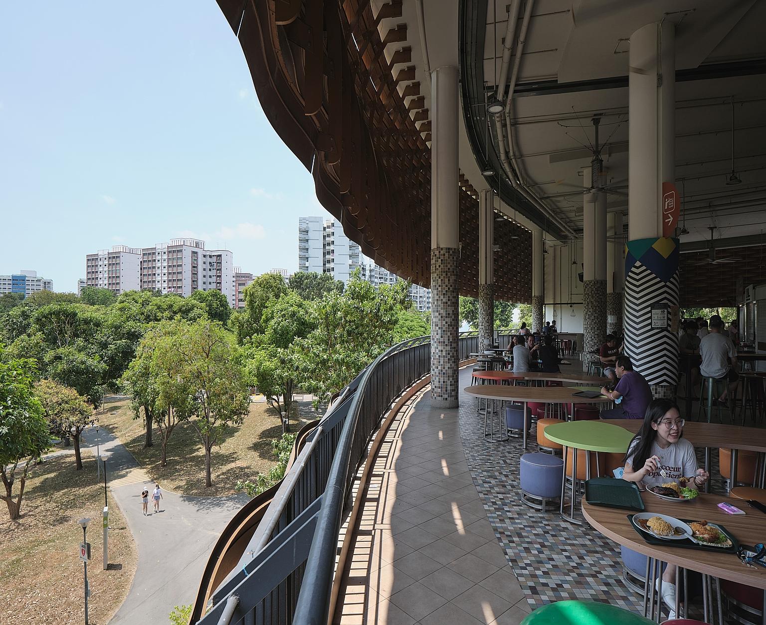 The architectural features captured by the photography series range from Tampines Round Market and Food Centre's circular roof to Pasir Ris Hawker Centre's wave-like metal facade (above). PHOTO: FABIAN ONG
