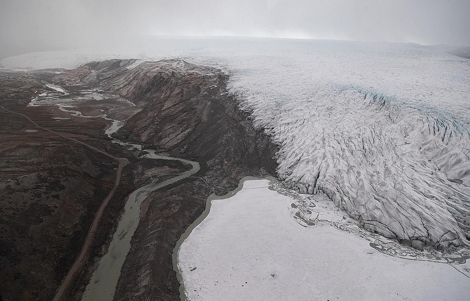 An aerial view of ice receding from a glacier near Kangerlussuaq, Greenland, last month. PHOTO: REUTERS