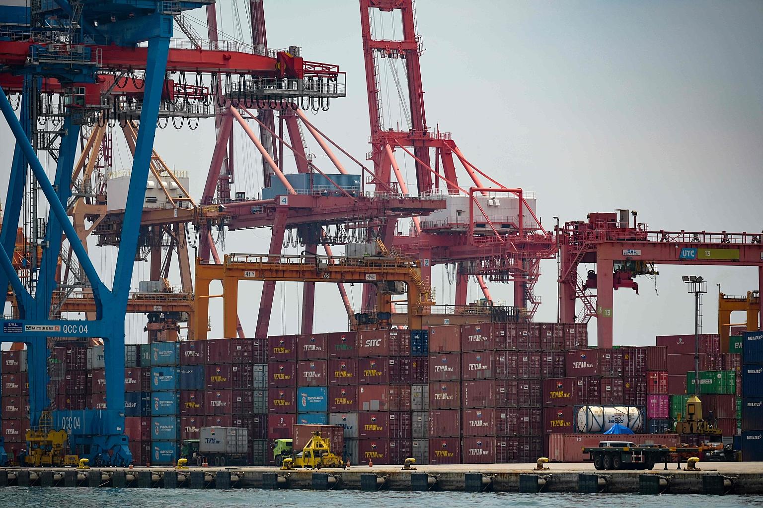 Stacks of containers at a port in Tanjung Priok, in Jakarta, on March 31. Indonesia's exports surged nearly 60 per cent last month - a rate of increase not seen since the commodity boom more than a decade ago. But with most of the world in lockdown l