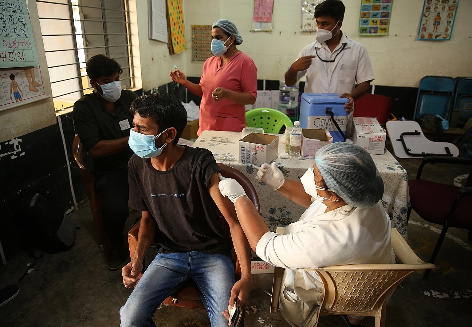 A man receiving a shot of a Covid-19 vaccine in Bangalore in India. Several hospitals have reported that some patients treated with Regen-Cov, a cocktail of two monoclonal antibodies, have shown quick recovery, even avoiding hospitalisation in some c
