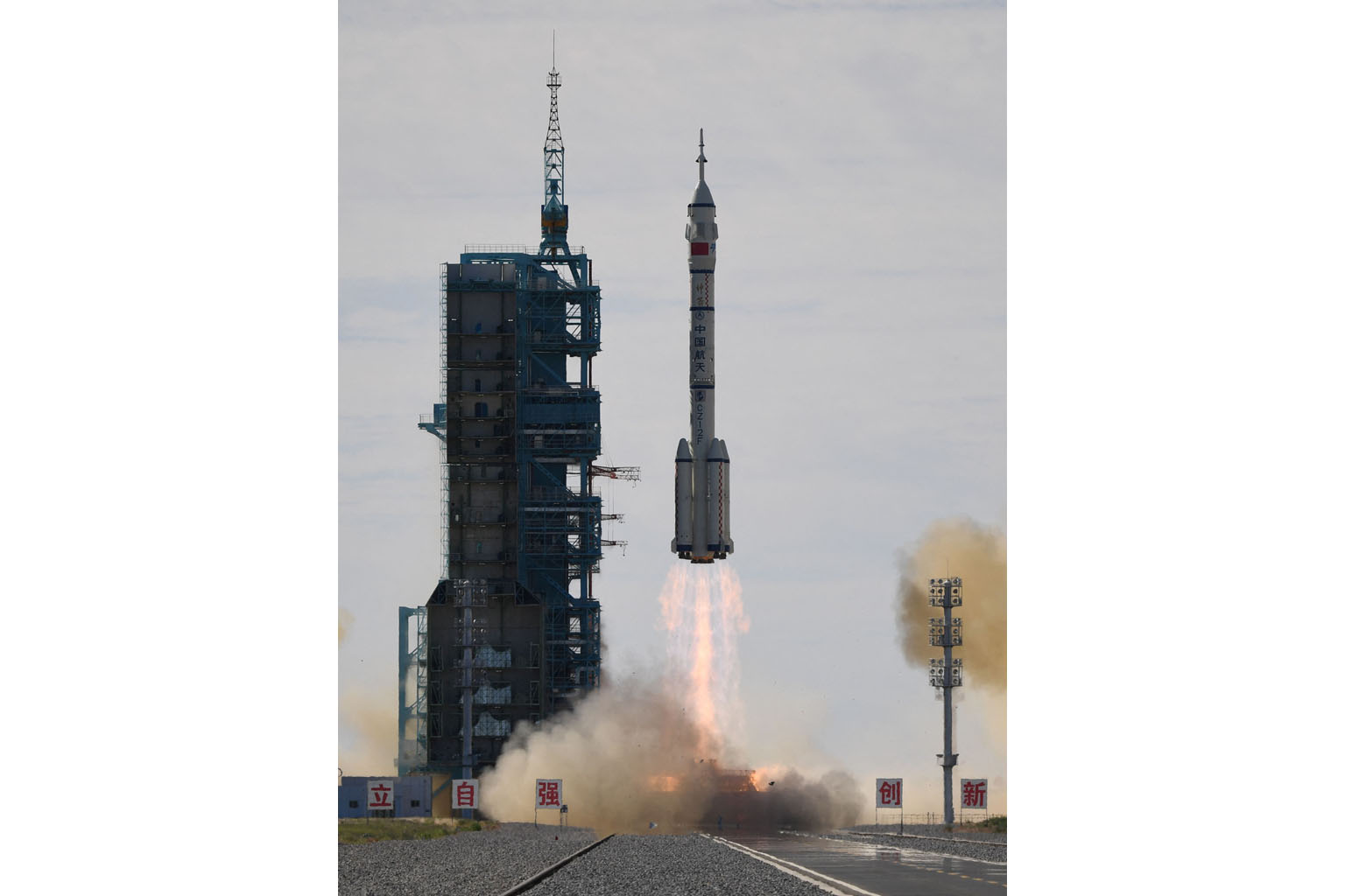 A Long March-2F rocket, carrying the Shenzhou-12 spacecraft and a crew of three astronauts, lifting off from the Jiuquan Satellite Launch Centre in the Gobi desert in north-west China yesterday. The crew boarded the space station core module Tianhe, 