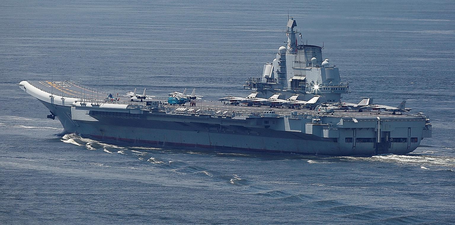 A 2017 file photo of China's aircraft carrier Liaoning. Earlier this week, 28 Chinese air force aircraft, including fighters and nuclear-capable bombers, entered Taiwan's Adiz, the largest reported incursion to date. PHOTO: REUTERS