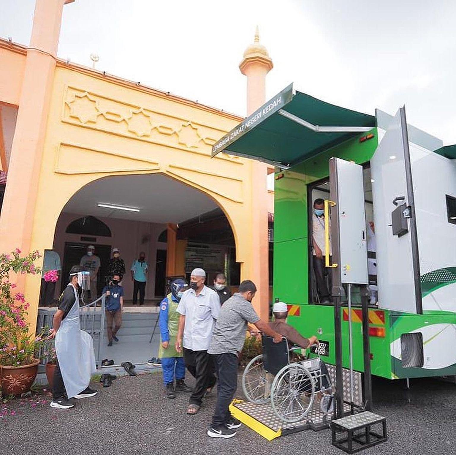 The Kedah Zakat Fund's mobile vaccination truck has been repurposed from a mobile clinic owned by the organisation. Malaysia is using such mobile clinics to ensure people living in the rural areas can get easier access to Covid-19 vaccines.