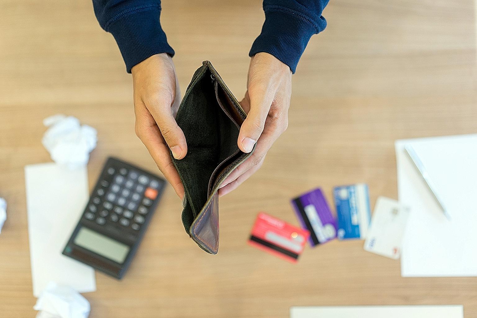 If you have a high credit card balance, now is a good time to consolidate that debt by transferring balances or signing on with a debt consolidation service that lets you make a single payment monthly, says the writer. PHOTO: ISTOCKPHOTO