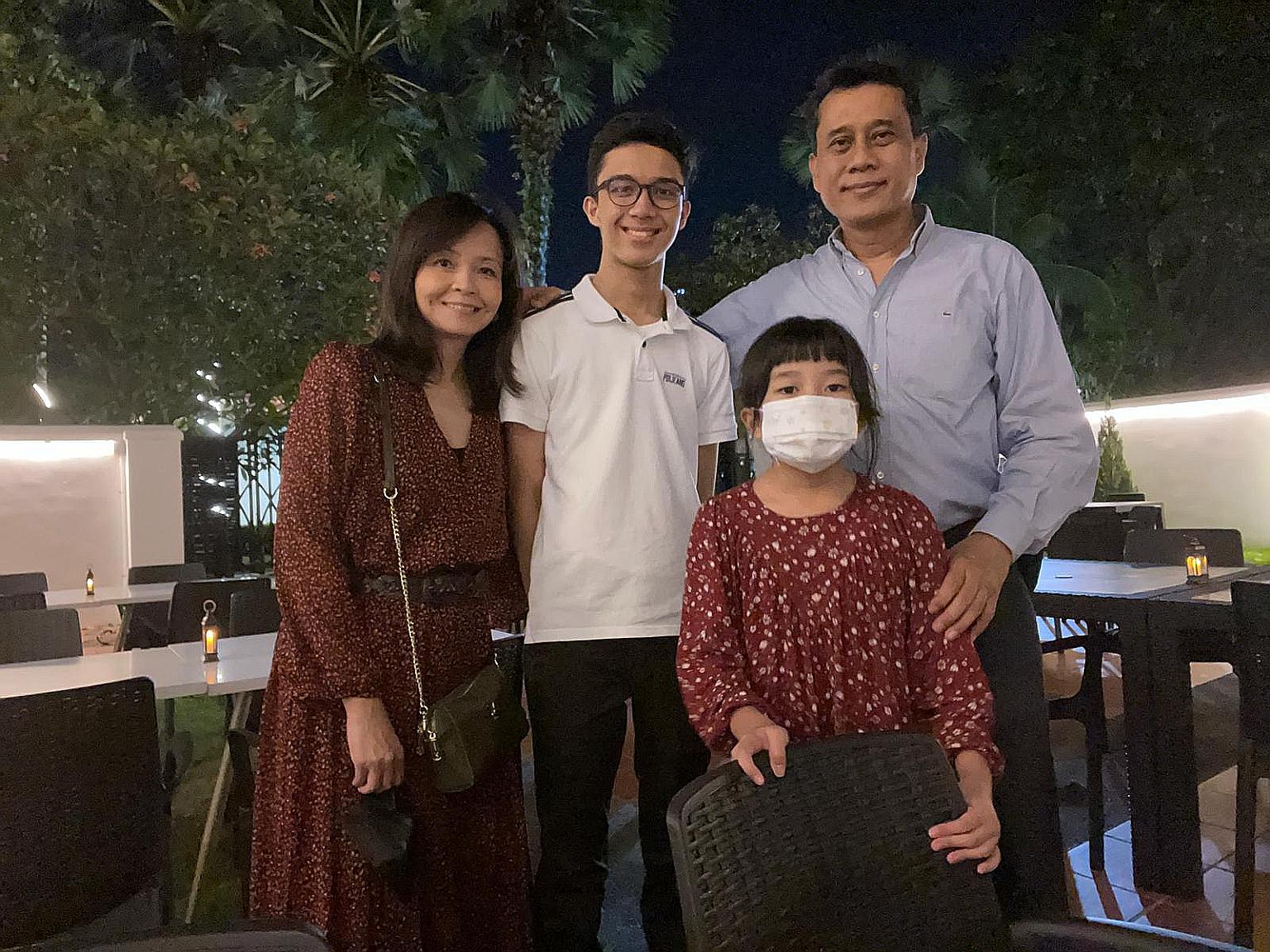 Mr Nor Nizar Mohamed, seen here with his wife Sharon Yeo and children Mikaail and Julia, quit his job as a personal driver in 2008 to become a stay-at-home dad. The couple had tried multiple childcare centres and also engaged a maid, but found that i