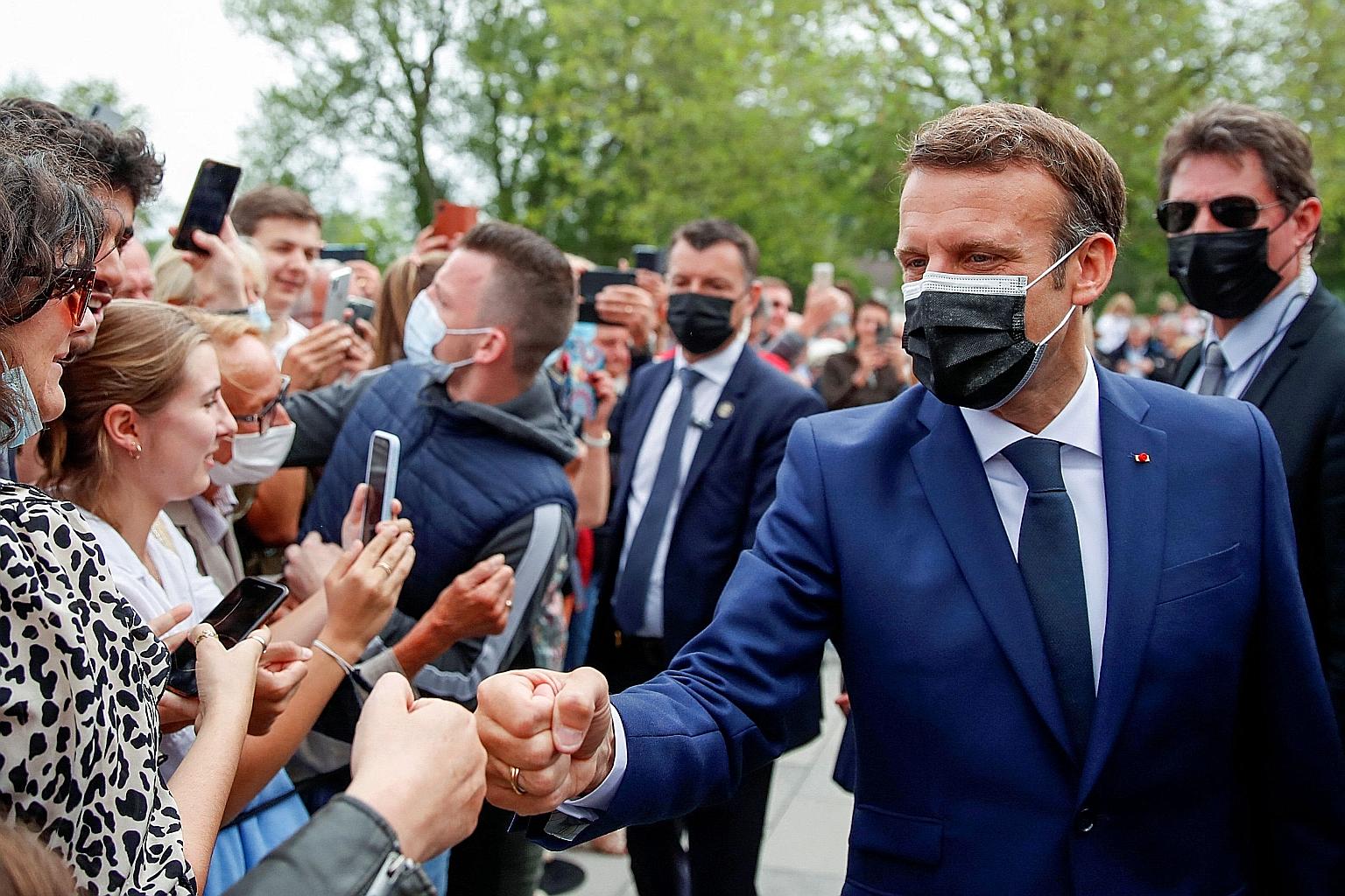 French President Emmanuel Macron greeting voters on Sunday at the polling station in Le Touquet. His party, La Republique en Marche, finished fifth in the first round of regional elections.
