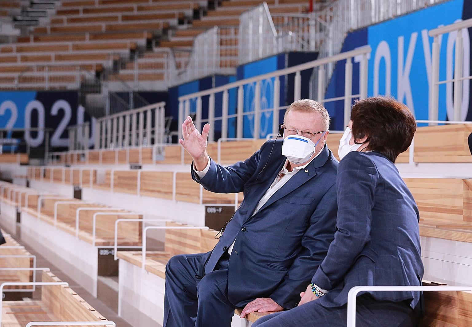 International Olympic Committee vice-president John Coates talking to Tokyo 2020 organising committee president Seiko Hashimoto during a visit to the Ariake Gymnastics Centre in Tokyo yesterday.