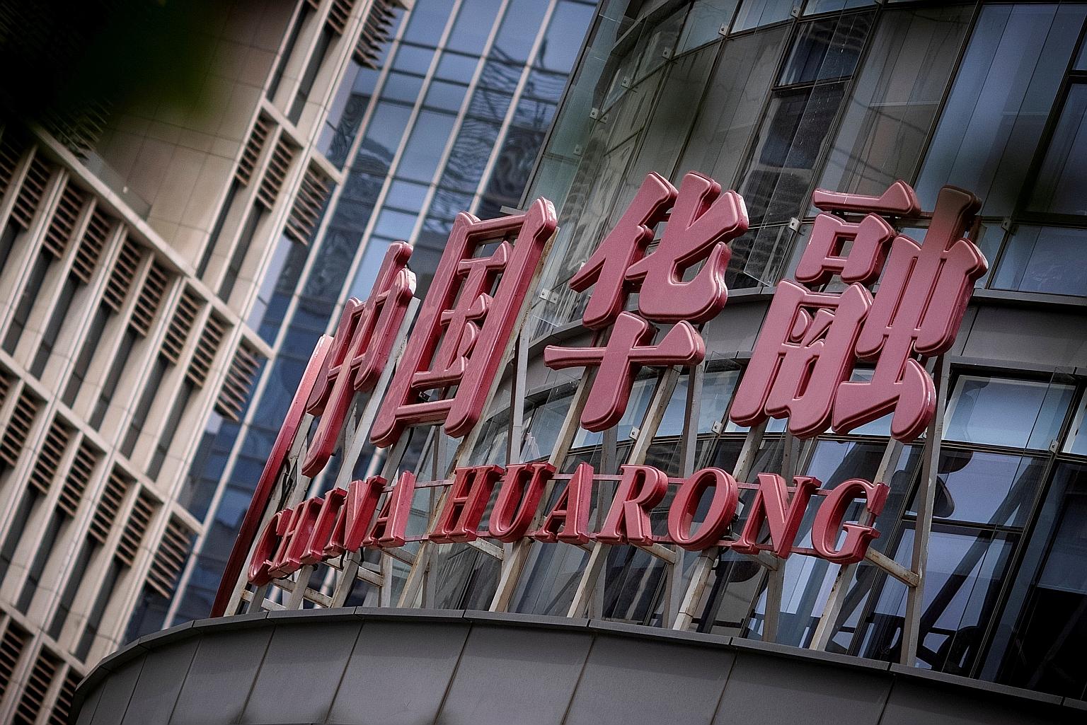 Ending the practice of allowing risk-taking by indebted giants such as China Huarong Asset Management while they are being shielded from potential consequences would make the financial system more resilient over the long run, but a major default woul