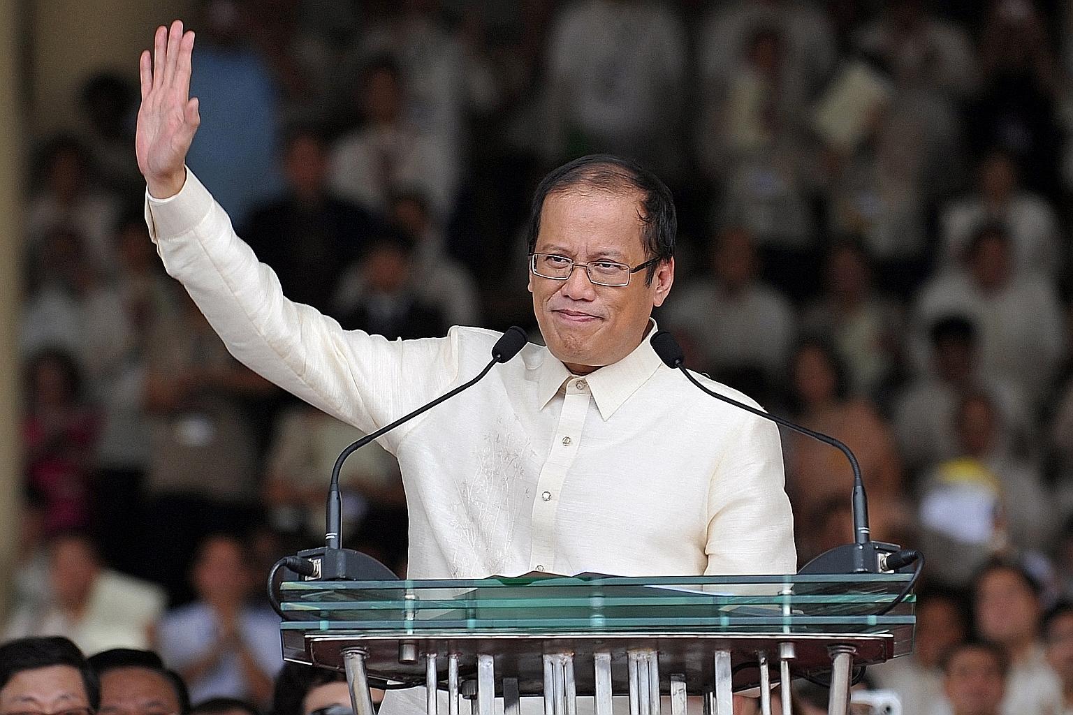 A file photo from 2010 showing Mr Benigno Aquino waving to the crowd after delivering his inaugural presidential speech.