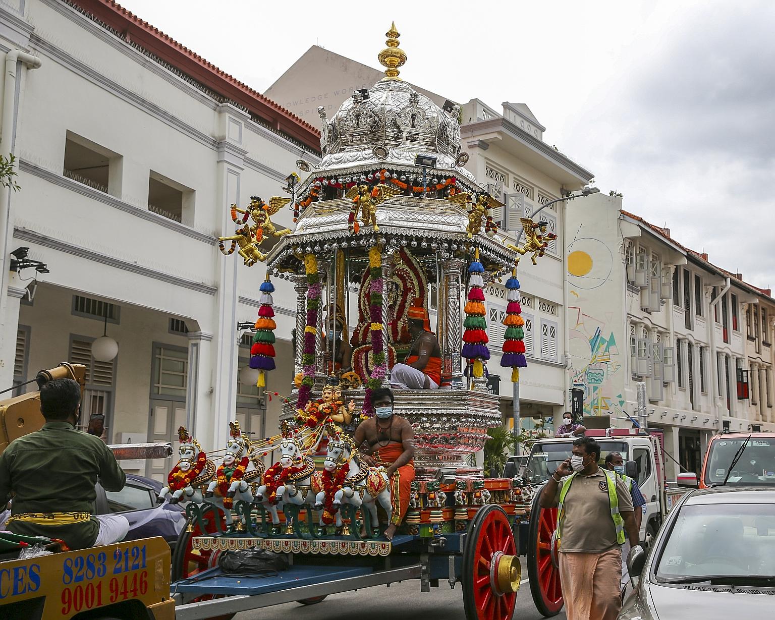 A chariot procession leaving the Sri Layan Sithi Vinayagar Temple in Keong Saik Road on Jan 27, the eve of Thaipusam. In Singapore, each community is encouraged to take pride in its own traditions.