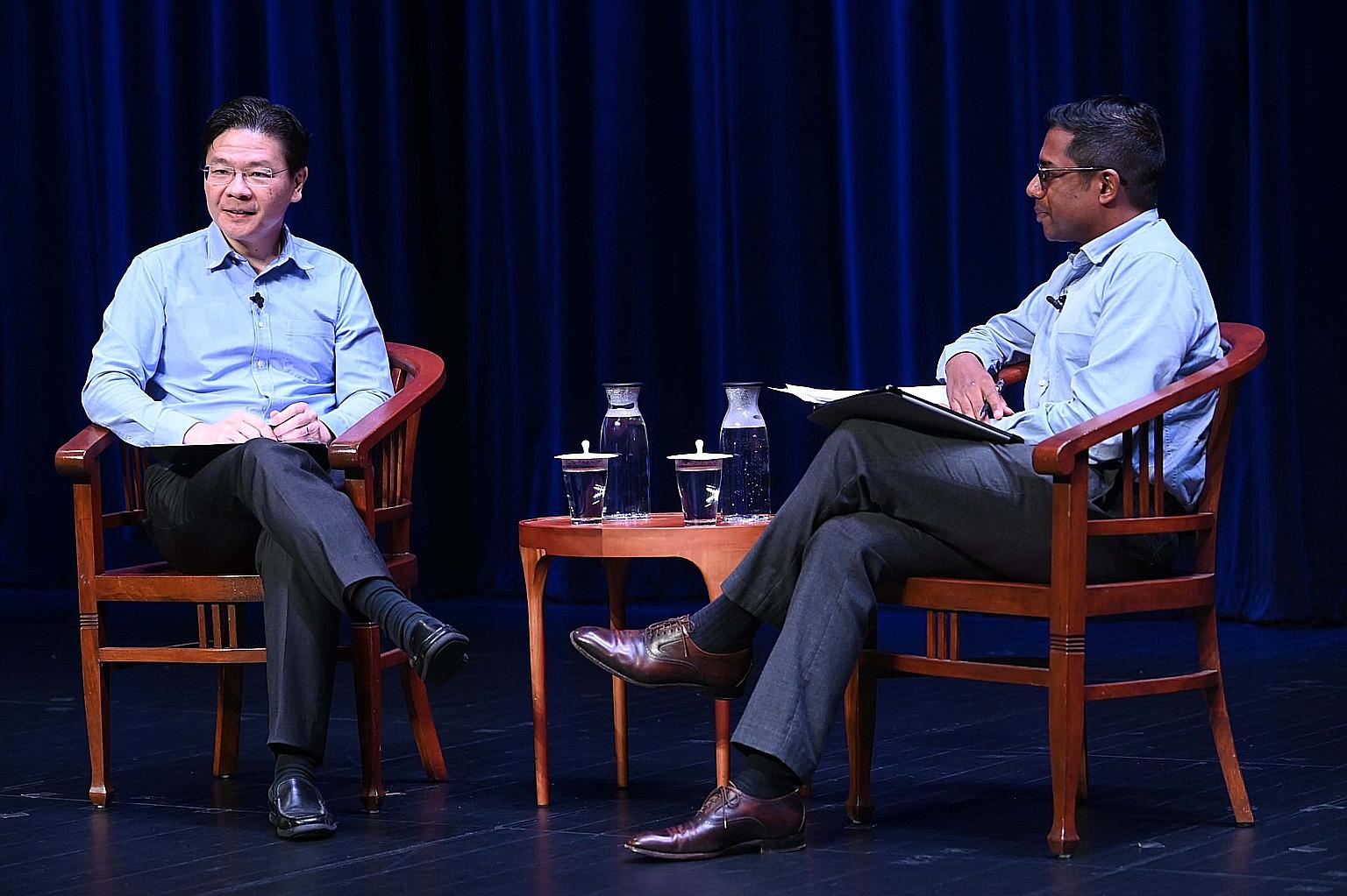 Finance Minister Lawrence Wong with moderator Shashi Jayakumar, senior fellow at the S. Rajaratnam School of International Studies (RSIS), at a forum on race organised by the Institute of Policy Studies and RSIS yesterday.