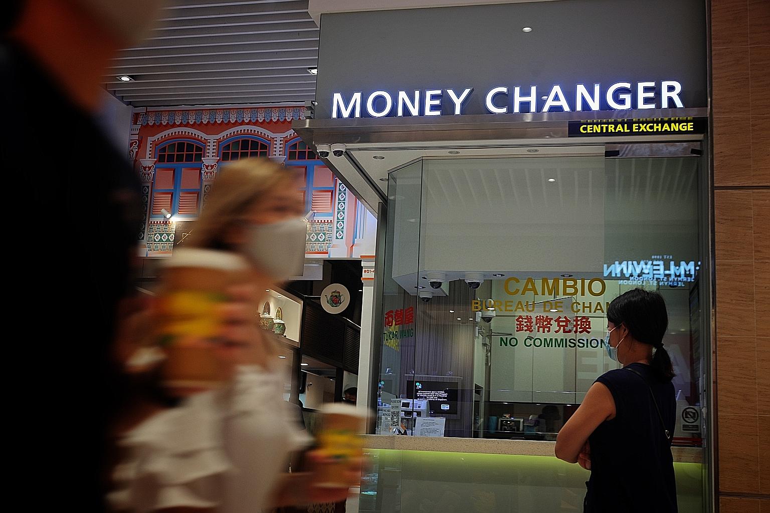 Mr Anwardeen's Central Exchange Money Changer at Suntec City. The owner said business fell by 95 per cent during the pandemic, and dropped by 98 per cent during phase two (heightened alert), when dine-ins were not allowed.