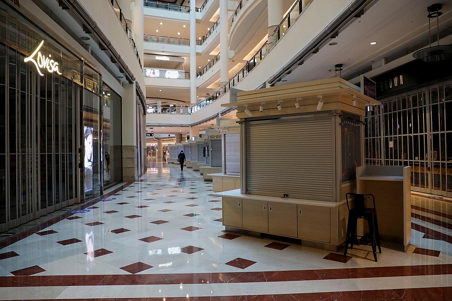 A near-empty shopping mall in Kuala Lumpur on June 1, at the start of a four-week full lockdown in Malaysia to deal with a surge in Covid-19 infections. The lockdown is due to expire tomorrow, but is expected to be extended.
