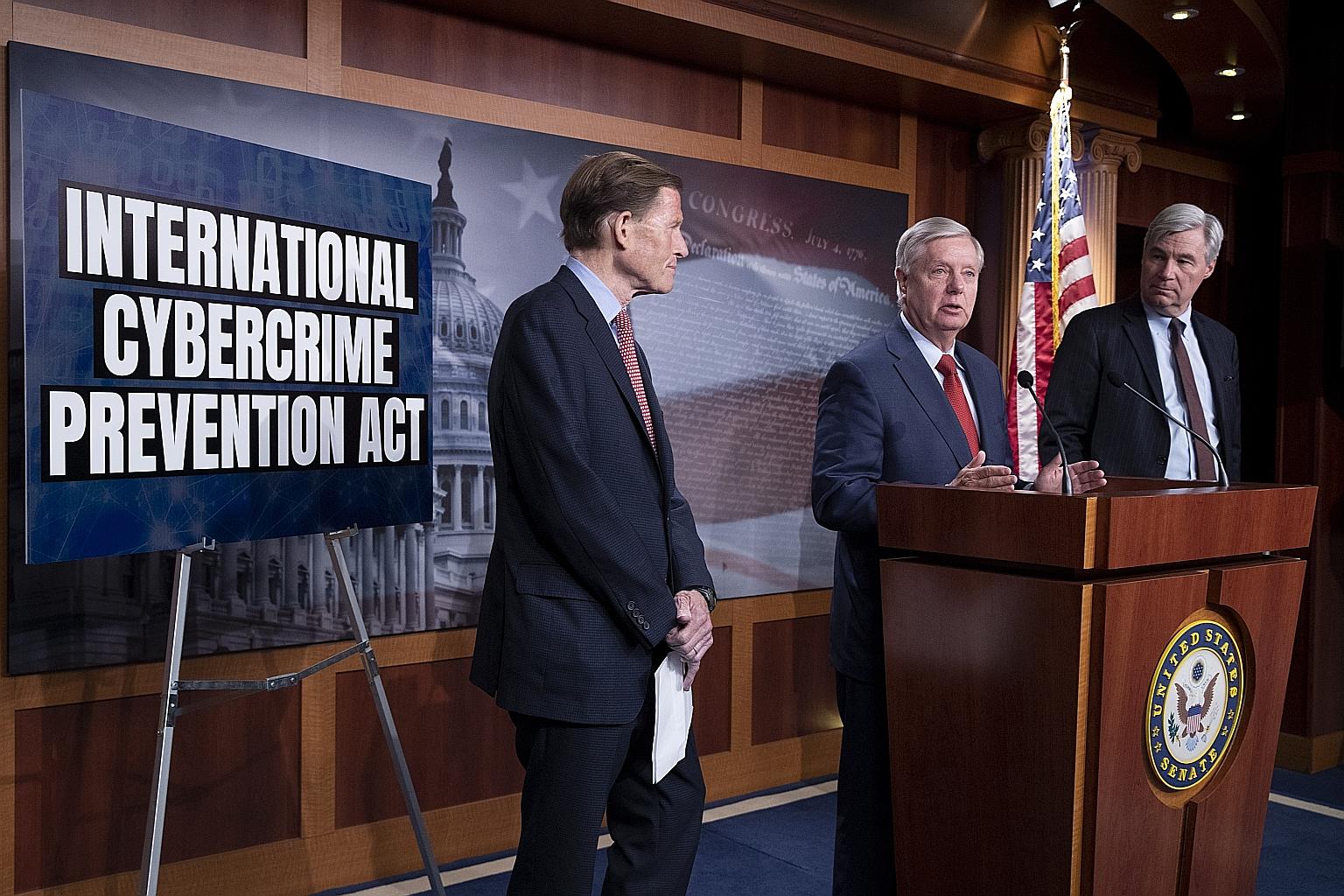 US Republican Senator Lindsey Graham (centre), with Democratic Senators Sheldon Whitehouse (right) and Richard Blumenthal at a news conference held to discuss the International Cybercrime Prevention Act, in Washington on June 17. The IISS study on cy