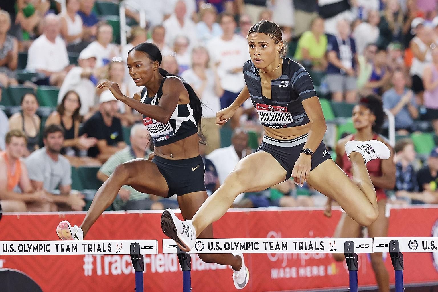 Sydney McLaughlin (far right) en route to breaking the 400m hurdles world record and inflicting a defeat on world champion Dalilah Muhammad at the US Olympic trials on Sunday with a time of 51.90sec.