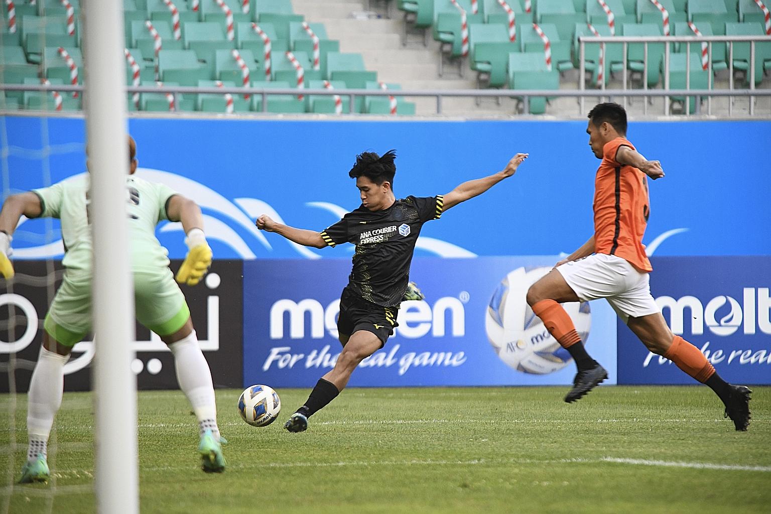 Tampines' Marc Ryan Tan attempting a shot against Chiangrai. The Singapore Premier League club have yet to open their scoring account in the AFC Champions League.