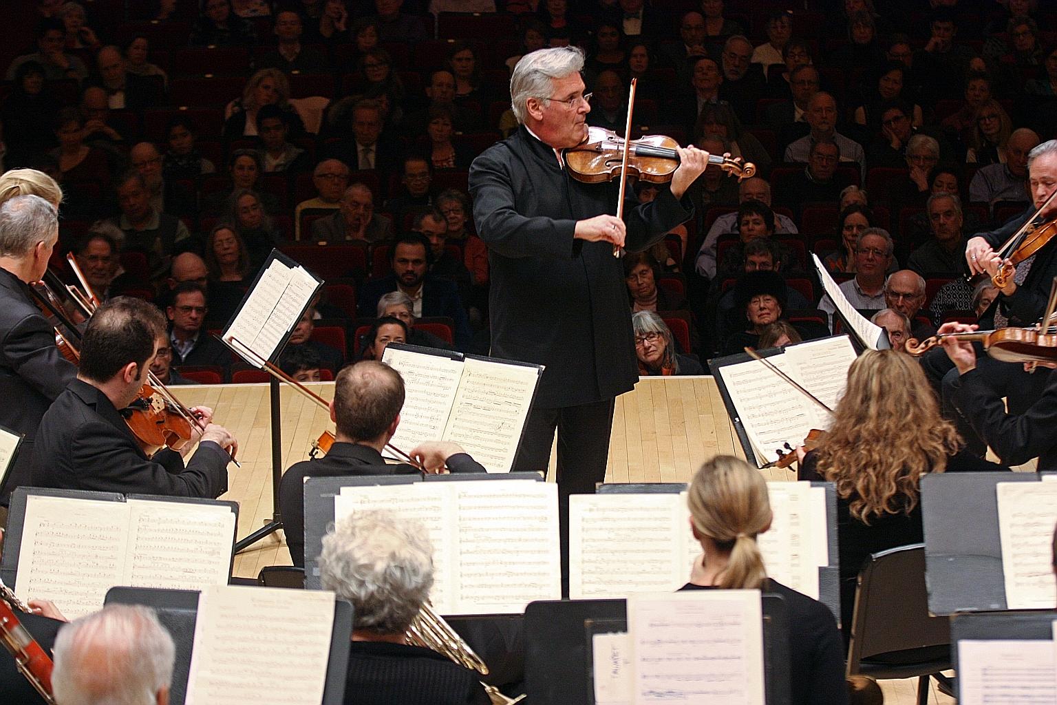A 2016 photo of Pinchas Zukerman in performance. The celebrated violinist and conductor angered many of the roughly 100 participants in a masterclass last Friday when he invoked racist stereotypes about Asians. PHOTO: NYTIMES