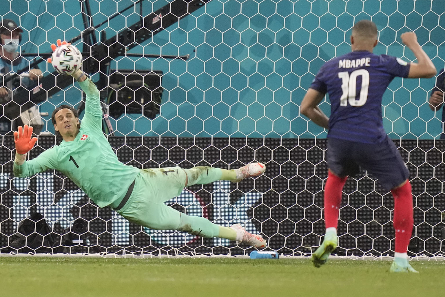 Goalkeeper Yann Sommer saving Kylian Mbappe's penalty to give Switzerland a 5-4 shoot-out win over France in the last 16 on Monday. It marked the end of a disappointing Euro for Mbappe, who had more shots (14) without scoring than any other player.