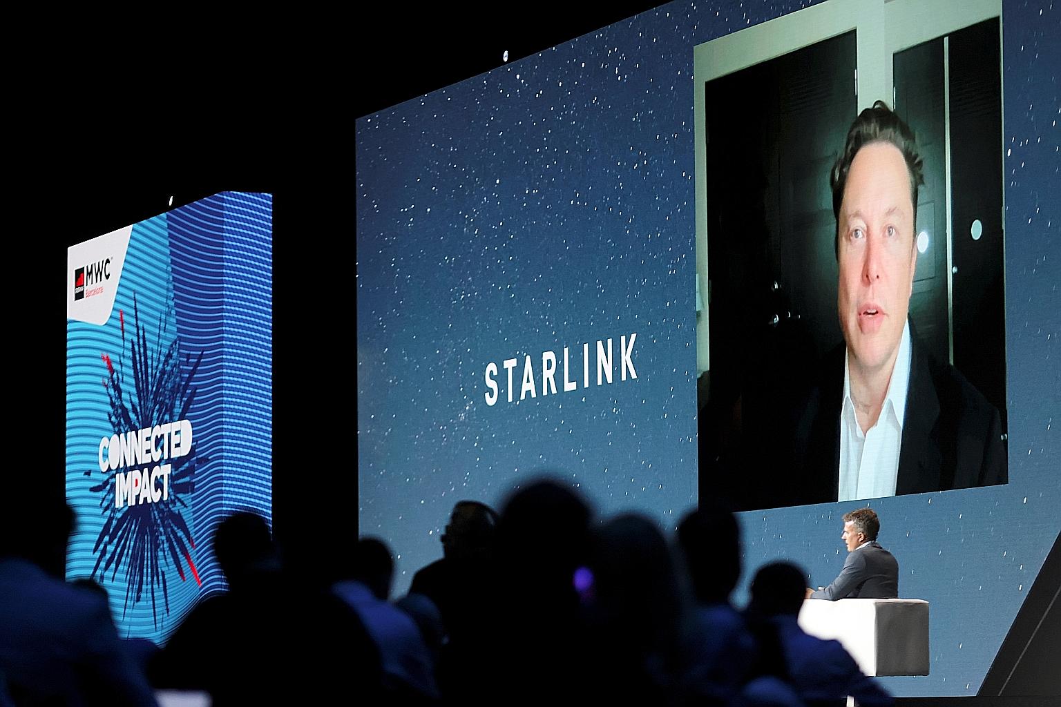 Mr Elon Musk speaking via video during the Mobile World Congress in Barcelona, Spain. His Starlink service has deployed over 1,500 satellites.