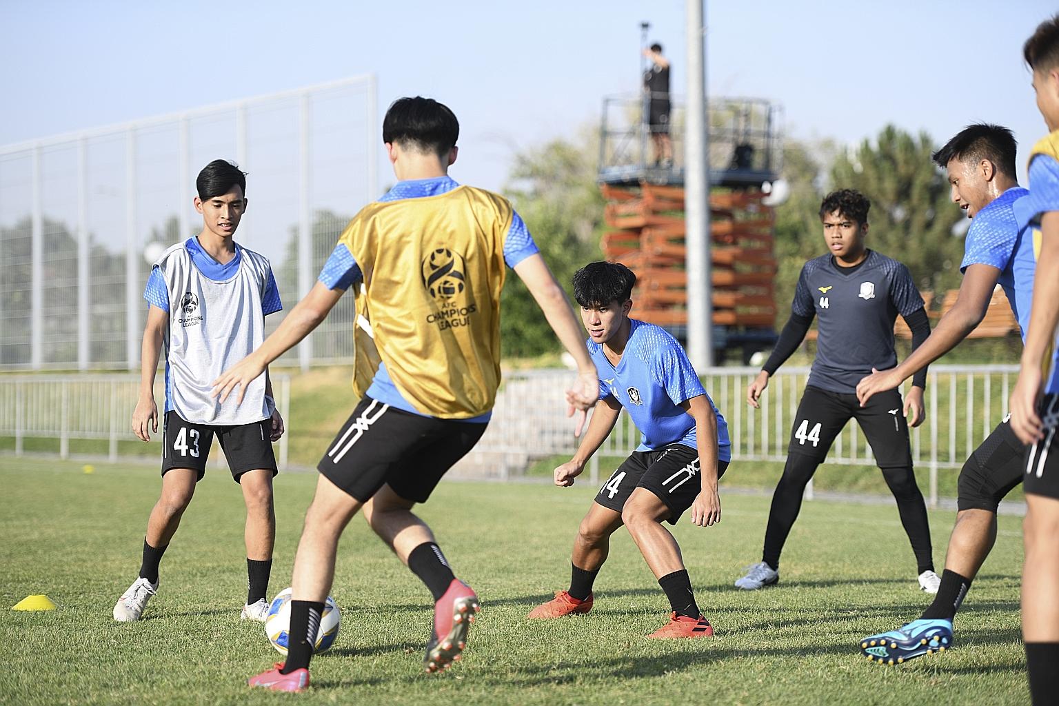 Tampines forward Marc Tan (centre), training with the team for the Asian Champions League in Tashkent, is inspired after facing the best players from the continent. The Stags take on South Korean champions Jeonbuk tonight after losses to Gamba Osaka