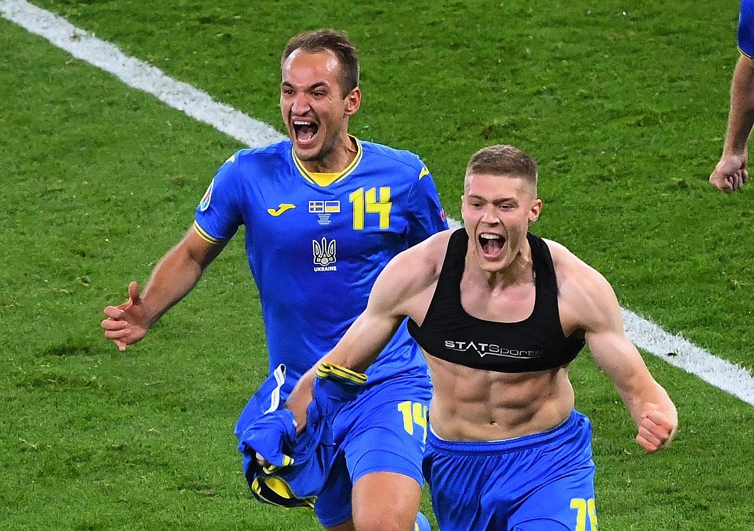 Ukraine's Artem Dovbyk (front) celebrating with Yevhenii Makarenko after scoring the winner in the 2-1 extra-time victory over Sweden on Tuesday. The win means they will face England in the quarter-finals in Rome on Saturday.