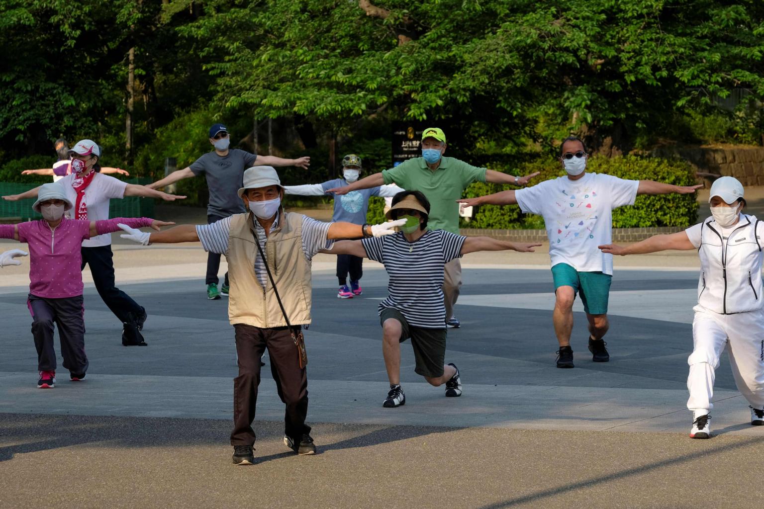 One, two, three! Millions of Japanese perform 'taiso' stretching ...