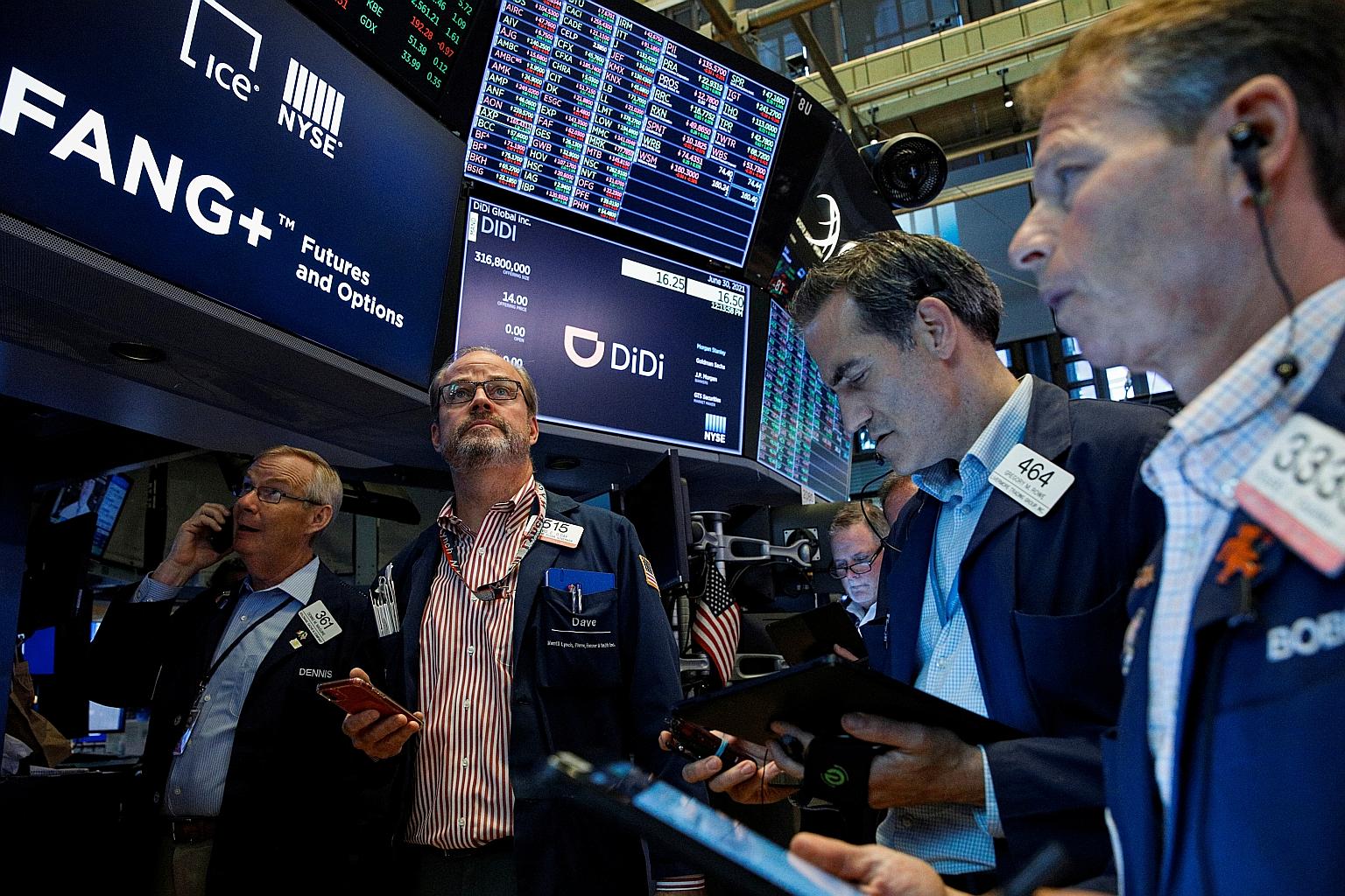 Traders on the floor of the New York Stock Exchange during the IPO for Chinese ride-hailing company Didi Global last Wednesday.
