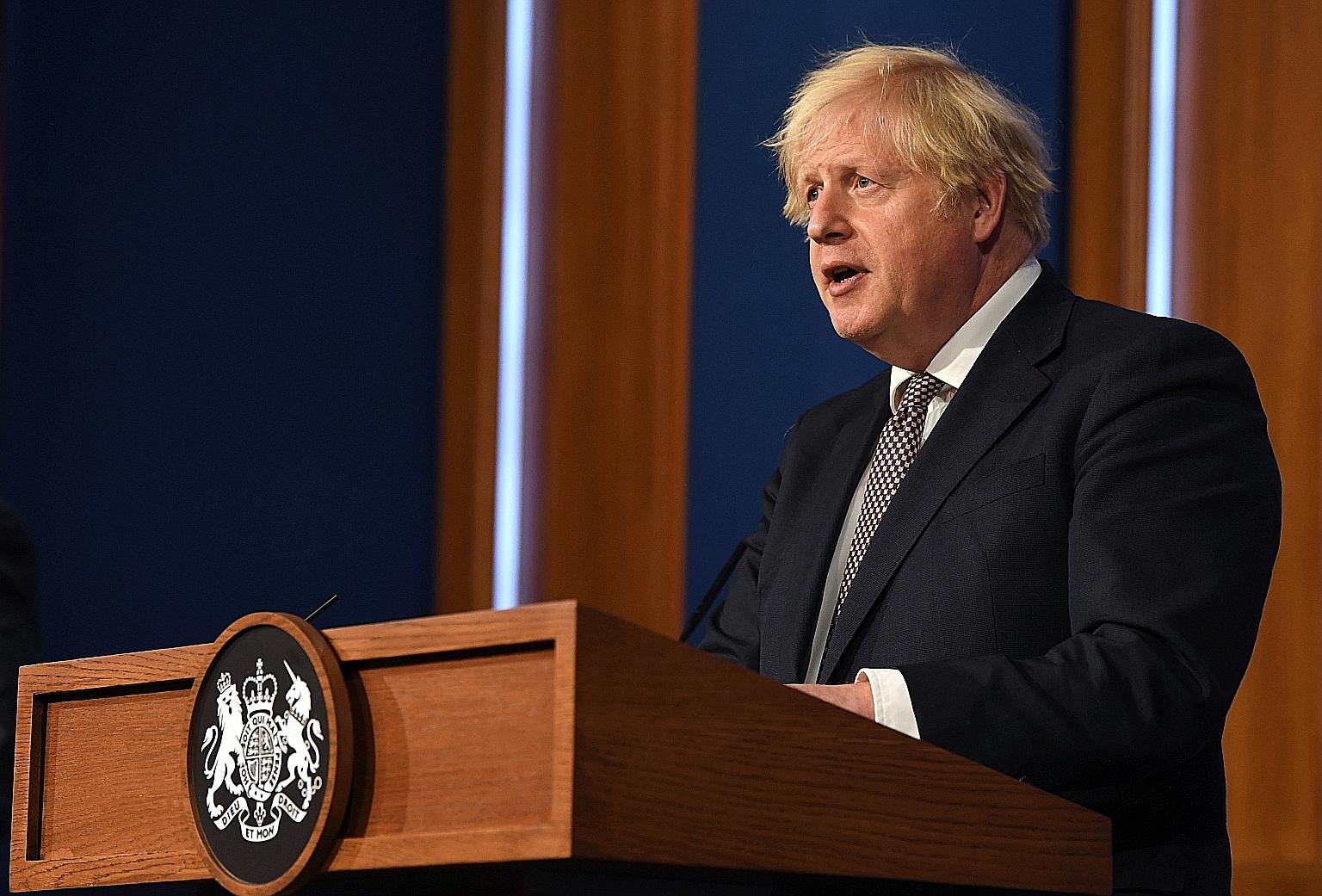 British Prime Minister Boris Johnson announcing on Monday the lifting of restrictions for England. The UK's constituent nations - Scotland, Wales and Northern Ireland - are lifting their own curbs more slowly.