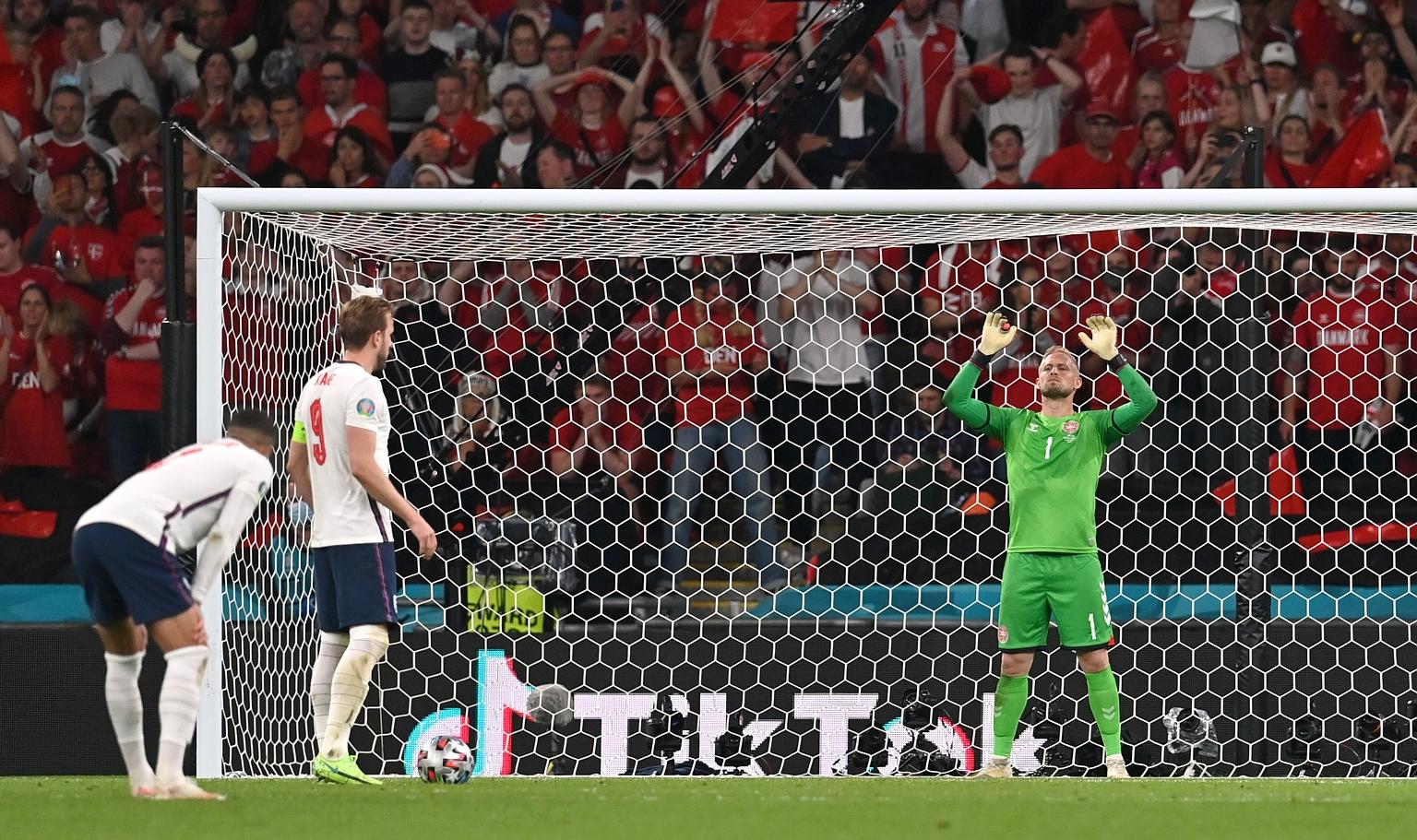 Harry Kane about to take England's extra-time penalty, which Denmark custodian Kasper Schmeichel saved before Kane scored from the rebound for the winning goal. Schmeichel had a laser pointed at his right side just before the spot kick.