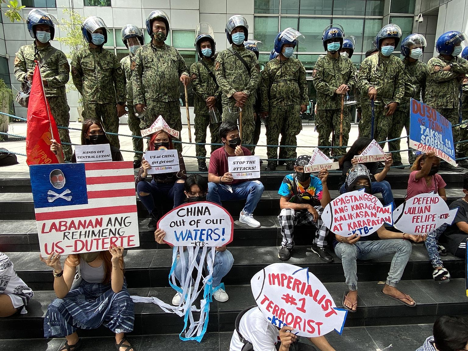 Filipino protesters outside the Chinese consular office in Manila yesterday, the fifth anniversary of an international tribunal ruling rejecting much of Beijing's claim to the South China Sea.