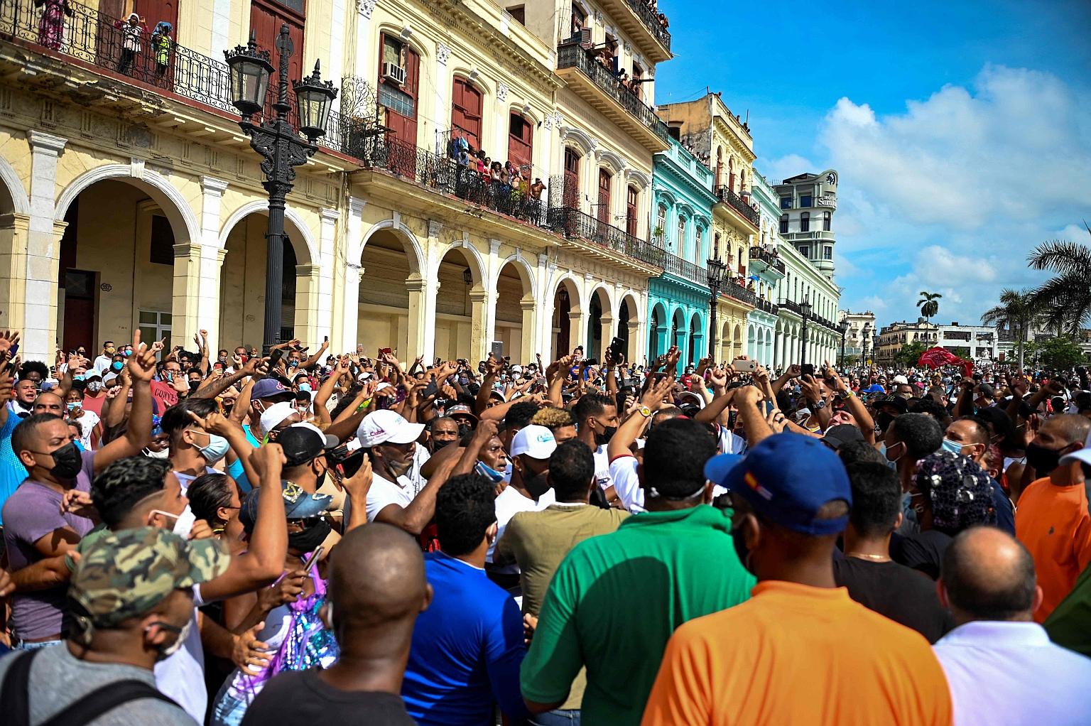 People protesting in the Cuban capital Havana on Sunday against the government of President Miguel Diaz-Canel. PHOTO: AGENCE FRANCE-PRESSE