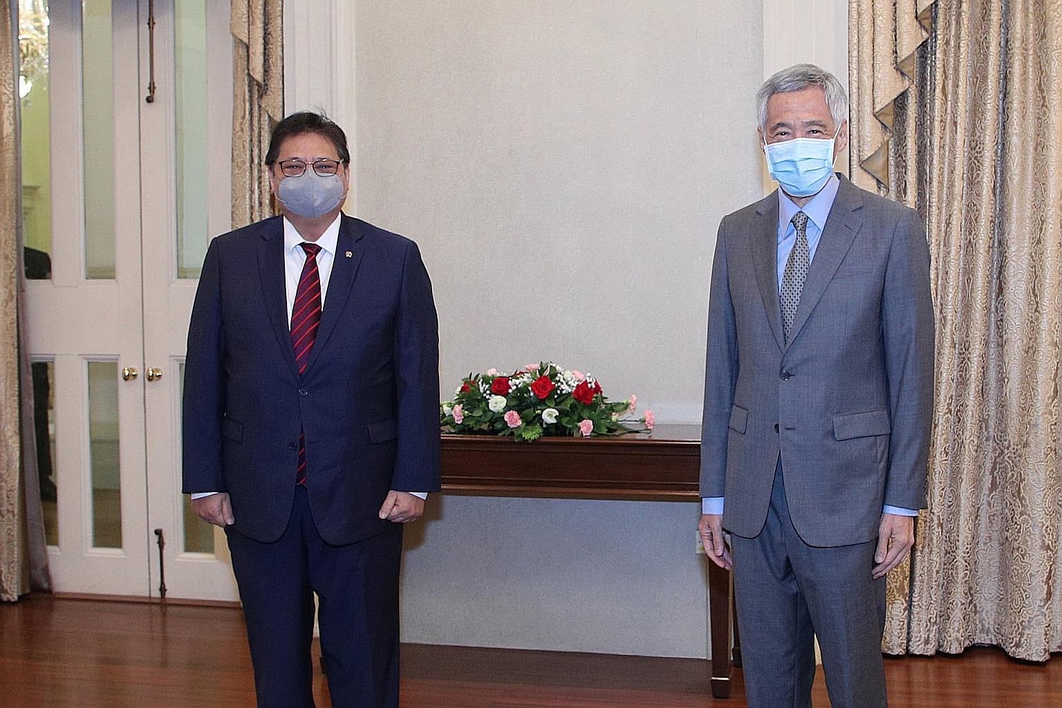 Prime Minister Lee Hsien Loong with Indonesia's Coordinating Minister for Economic Affairs Airlangga Hartarto when the latter called on him yesterday. PM Lee noted the strong friendship between the two countries. PHOTO: MCI