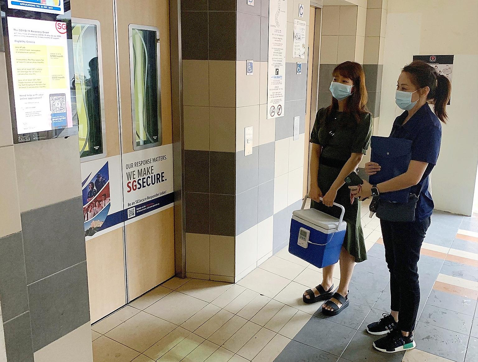 A home vaccination team from the Health Promotion Board preparing to visit a home-bound person to administer the Covid-19 vaccine jab. The vaccination rate for seniors is at 71 per cent, lower than for other age groups. PHOTO: HEALTH PROMOTION BOARD