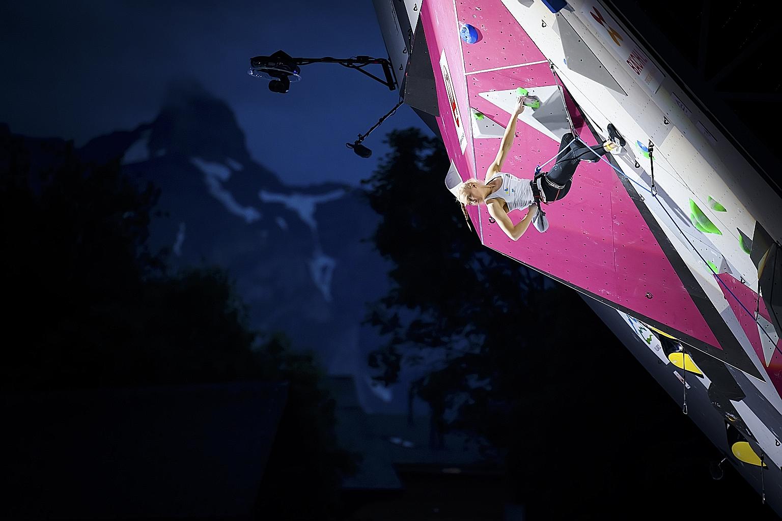 Slovenian climber Janja Garnbret on the way to winning the women's lead final at the Climbing IFSC World Cup in Villars-sur-Ollon, Switzerland on July 3. PHOTO: EPA-EFE