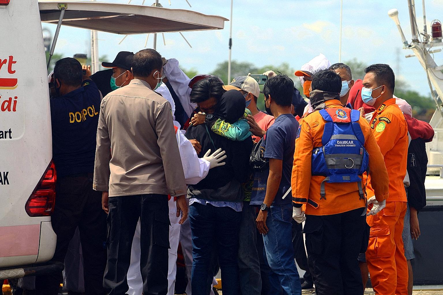 Rescuers in Pontianak preparing to head out yesterday to search for survivors after Wednesday's storm that battered West Kalimantan. PHOTO: AGENCE FRANCE-PRESSE
