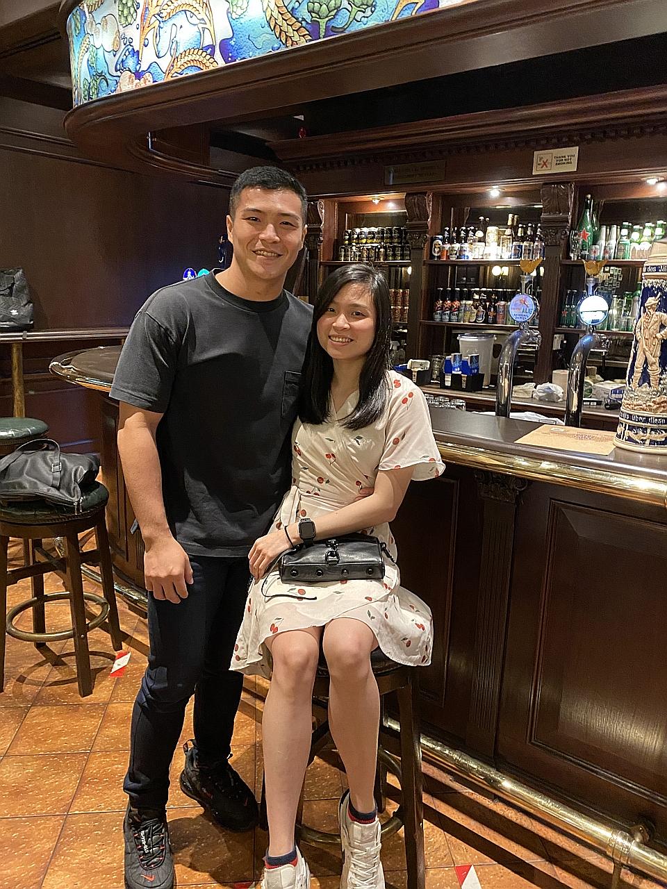 Mr Nigel Sim, 26, with his girlfriend Ms Sally Tan, 26. The couple met on Tinder earlier this year.