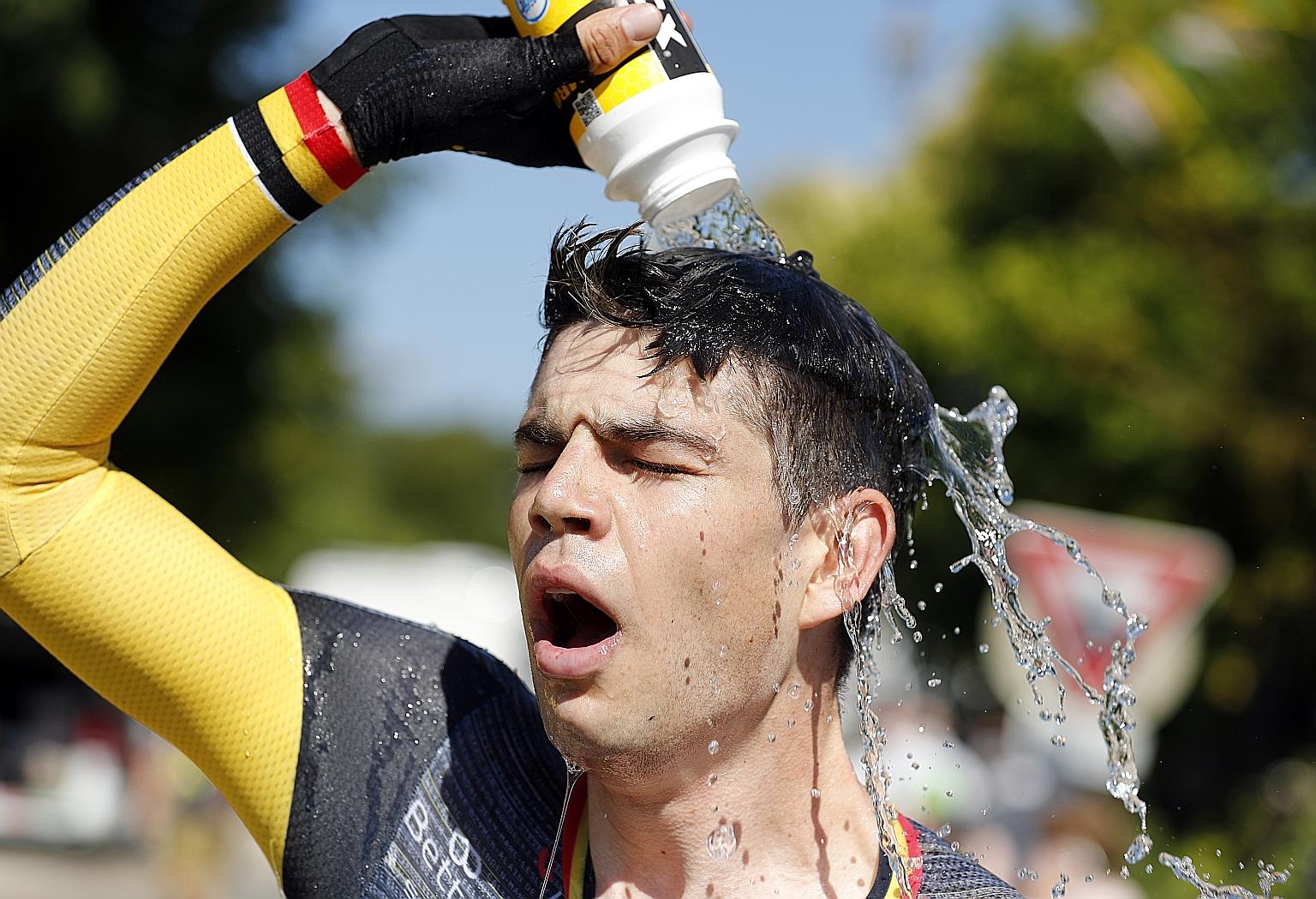 Team Jumbo-Visma rider Wout van Aert cooling himself down after winning Stage 20 of the Tour de France yesterday. The Belgian said that winning a time trial had always been one of the biggest objectives in his career.