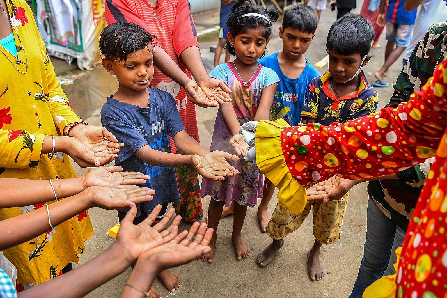 Children in Mumbai, India, being taught Covid-19 safety protocols last month. While India is expected to overtake China as the most populous country by 2027, fertility rates in most of its states have dipped below the population replacement rate of 2