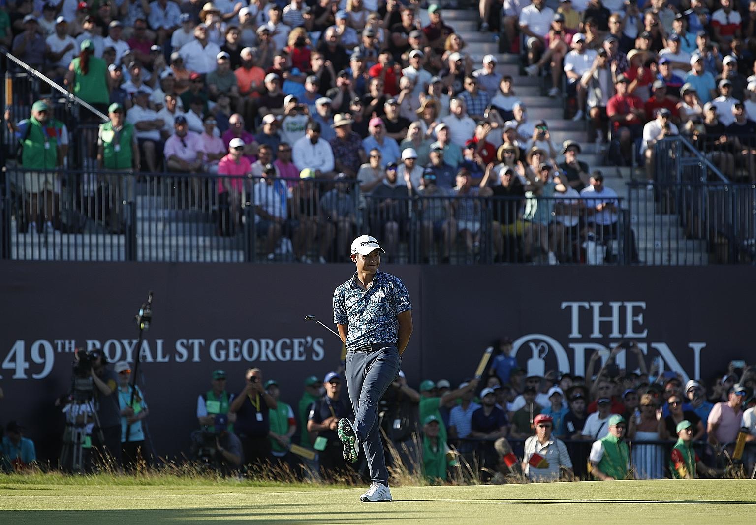 American golfer Collin Morikawa reacting on the 18th green at the British Open on Sunday. The 24-year-old won by two strokes with a 15-under 265 total and is the first men's player to win two different Majors in his first appearance.