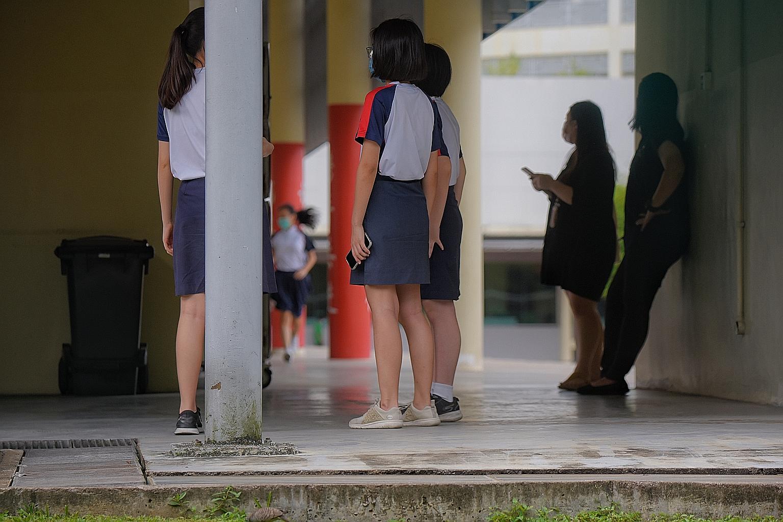 River Valley High School students on campus yesterday. The school has reached out to students, parents and staff to provide support.