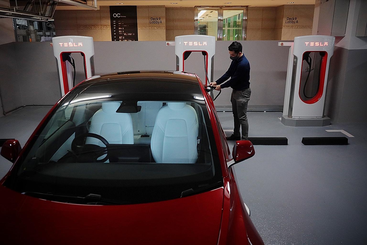 Tesla charging points at the carpark in Orchard Central. The Tesla V3 supercharger, which is only for Tesla vehicles, is expected to shorten charging time to 15 minutes. Typical electric vehicle chargers can take up to a few hours to charge a car.